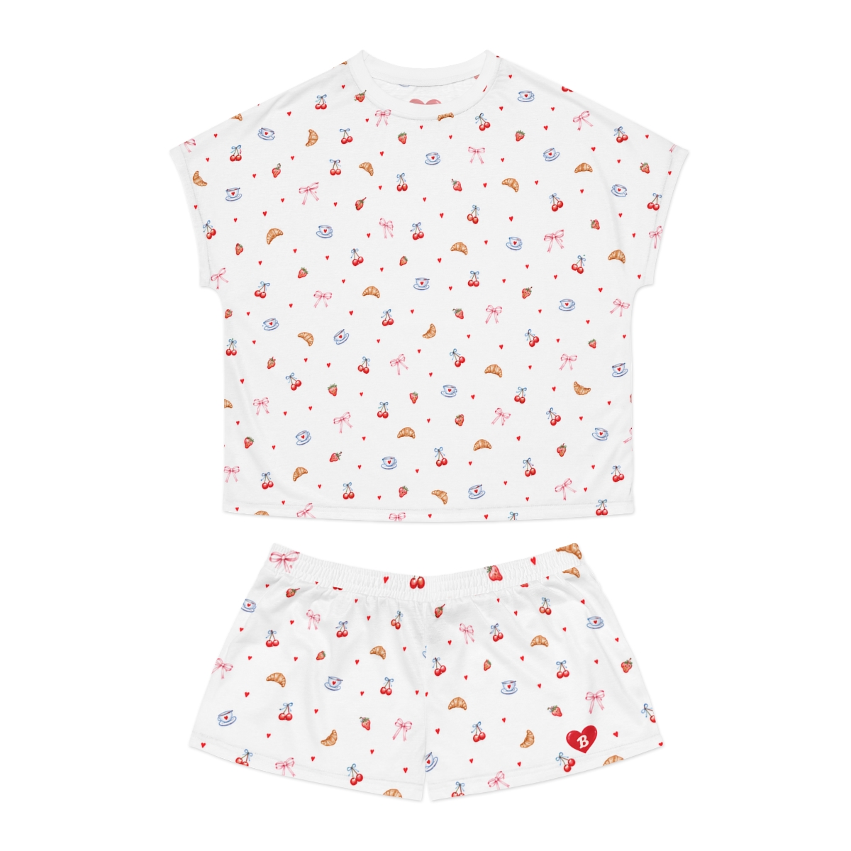 Flat lay of Breakfast in Bed white printed tee and shorts set