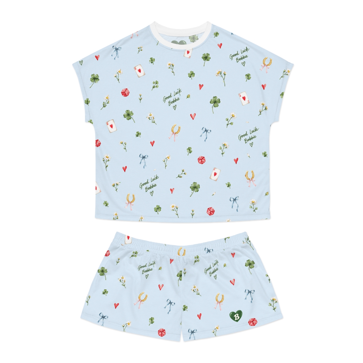 Flat lay of Good Luck Bobbie pale blue printed tee and shorts set