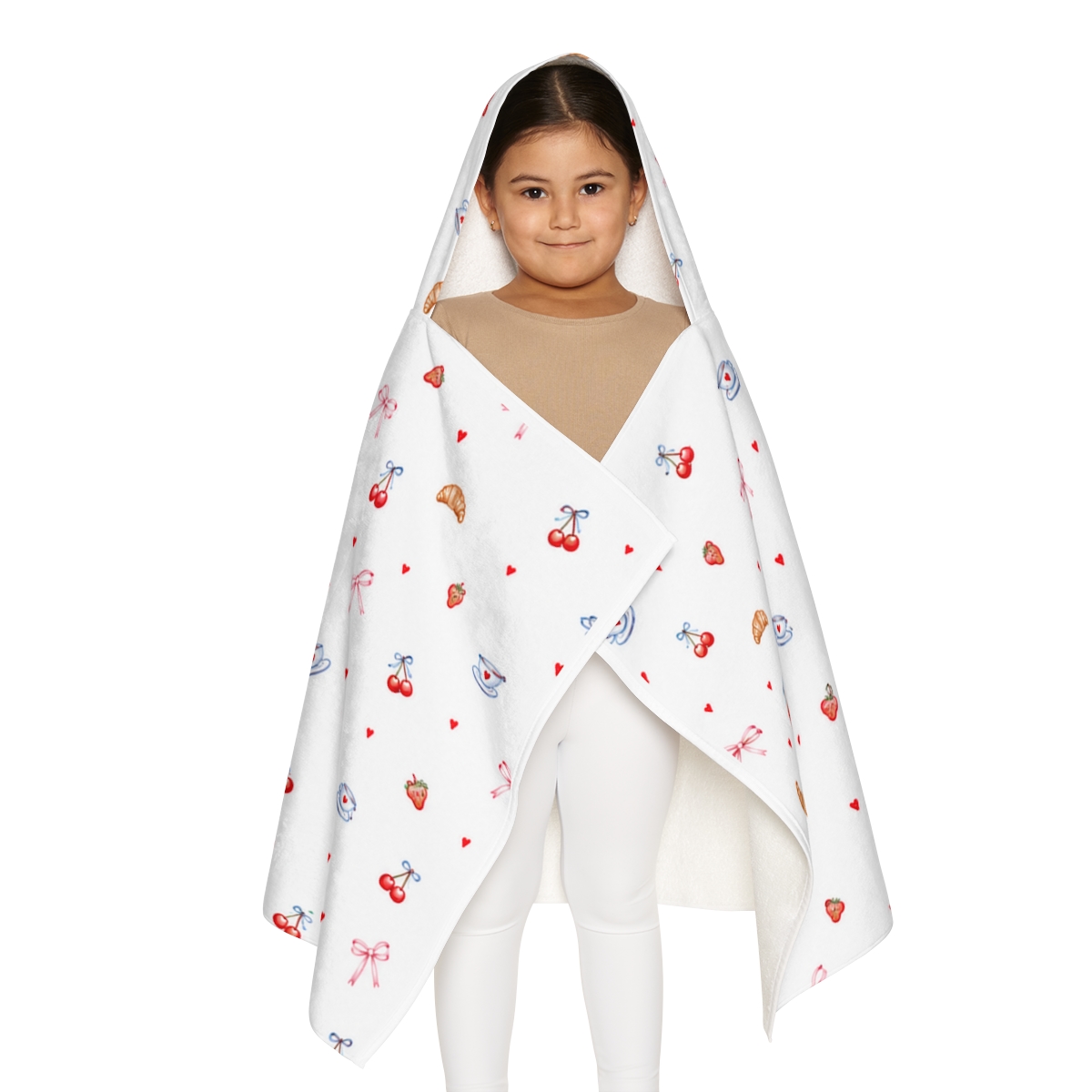 Child wearing the Breakfast in Bed hooded towel